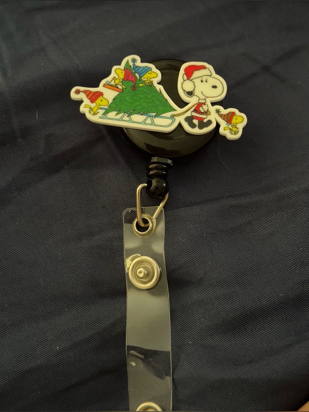 Black Snoopy Holiday Badge Reel with Green Christmas Tree